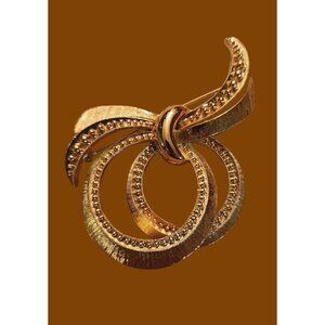 Vintage Monet Gold-Tone Ribbon Brooch with Textured & Polished Details